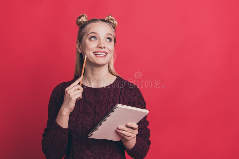 Close up photo portrait of pretty nice girl imaging inspired about entering university writing down her thought plans