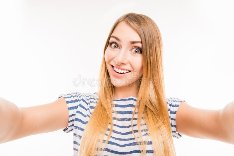 Close up photo portrait of pretty smiling girl taking selfie royalty free stock image Close up photo portrait of pretty smiling girl taking selfie royalty free stock image