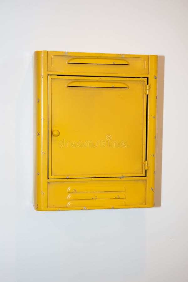 Closeup Photo of Vintage Yellow Mail Box with Empty Sign Stock Image