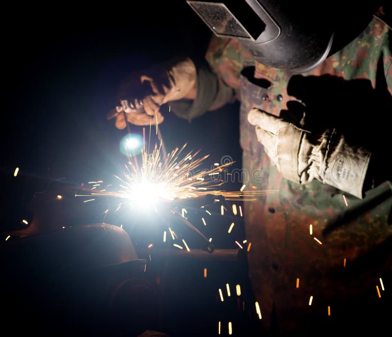 Close Up Photo of Welding, Welder at Works. Stock Photo Image of