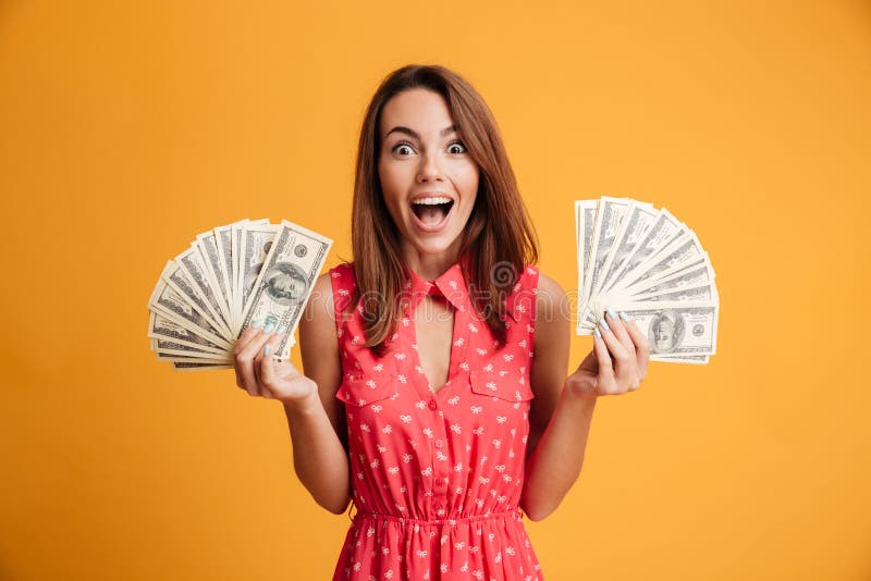 Close-up photo of young happy woman in red dress holding two fan