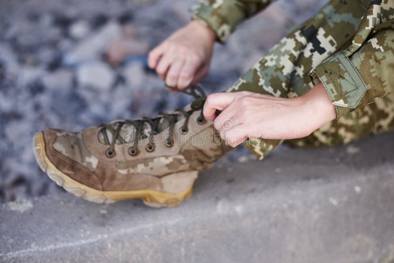 Close-up Picture of Military Khaki Green Ankle Boots. Two Woman`s Hands ...