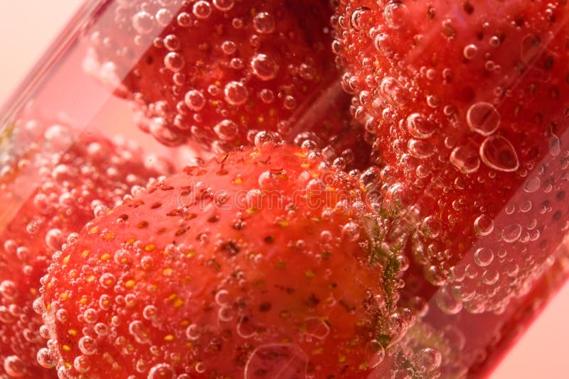 Close up picture of strawberries in glass
