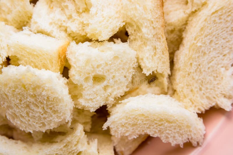 Close up pieces of bread in bowl