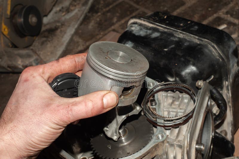 Closeup of Piston and Rings on the Connecting Rod. Details of the Car