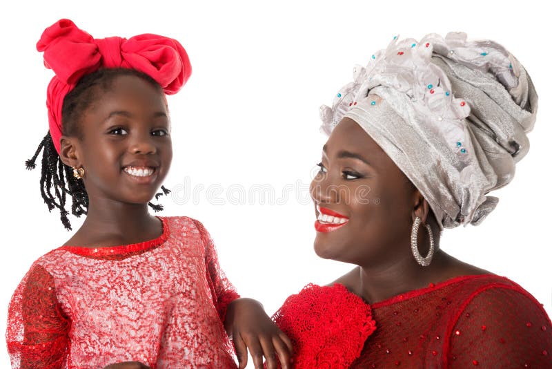 Close up portrait of African woman with little girl in tradition red clothing royalty free stock image Close up portrait of African woman with little girl in tradition red clothing royalty free stock image