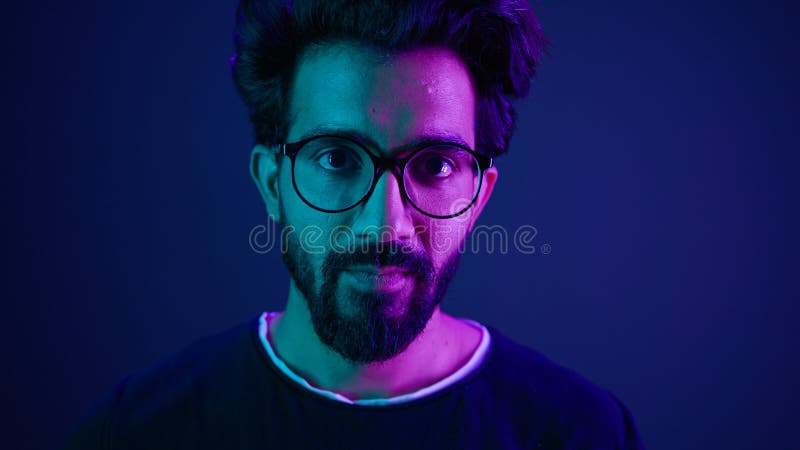 Close up portrait Arabian Indian man guy male programmer coder put on glasses 3d dimension focus gesture insight good stock photos