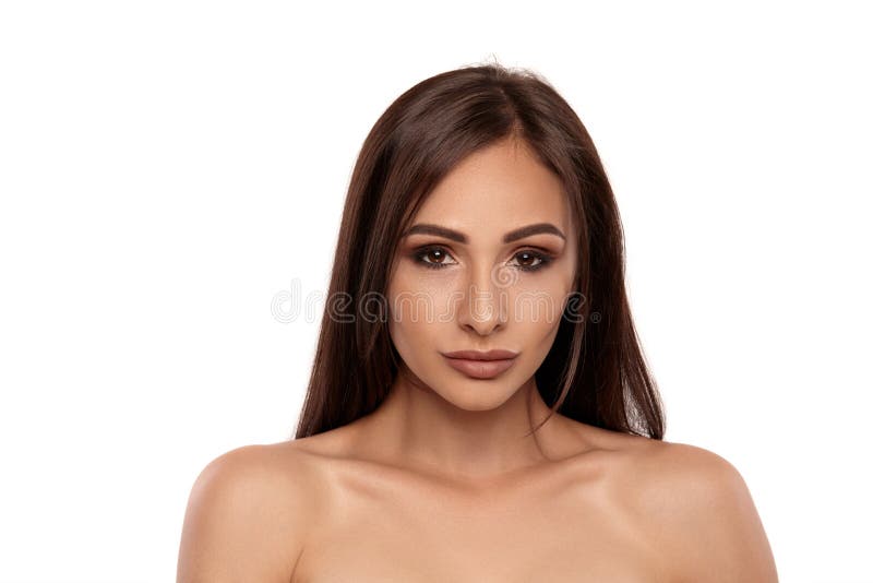 Close Up Portrait Of A Brunette Nude Model Girl With Professional Evening Make Up And Plump Lips