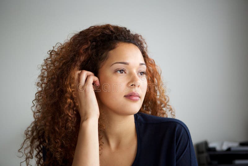 Close Up Beautiful Mixed Race Woman Thinking And Looking Away Stock