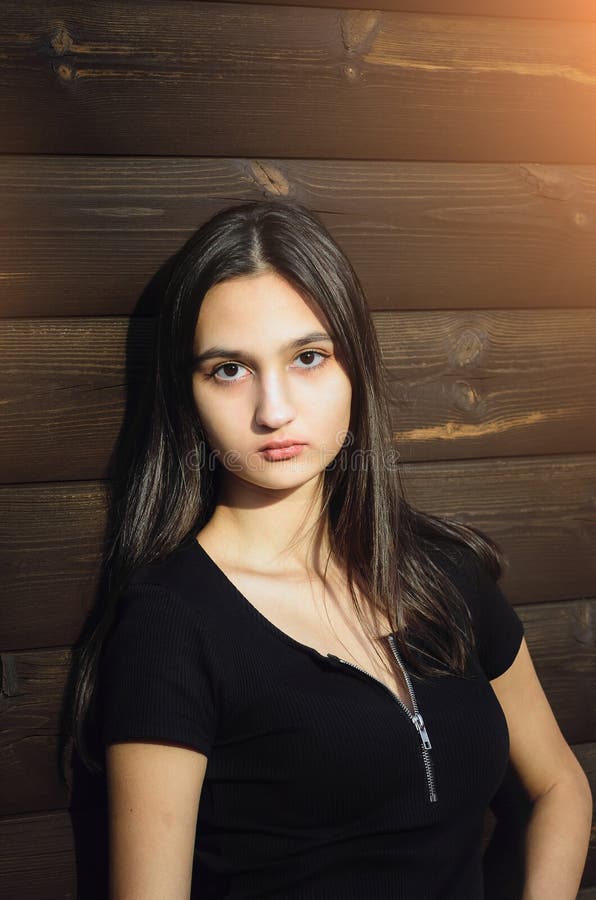 Portrait of a beautiful sad girl with long dark hair royalty free stock photos Portrait of a beautiful sad girl with long dark hair royalty free stock photos