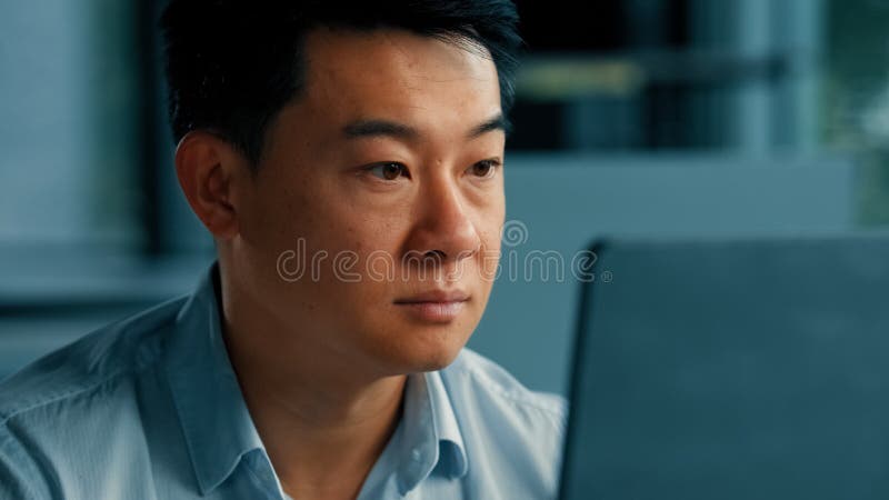 Close up portrait chinese japanese focused man professional asian korean worker web designer businessman work with