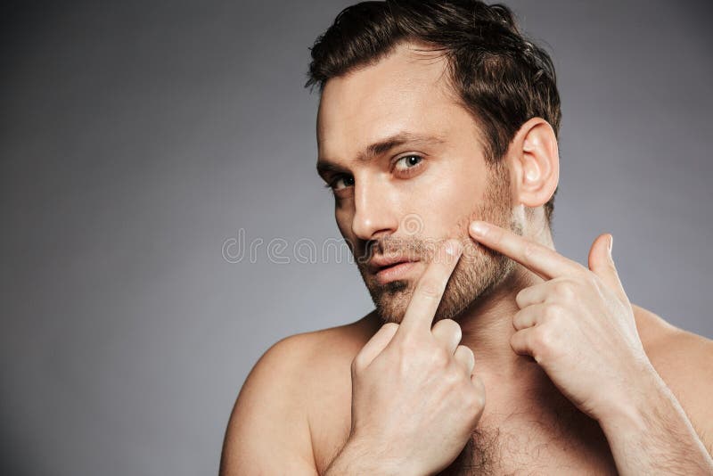 Close up portrait of a concentrated shirtless man stock images Close up portrait of a concentrated shirtless man stock images