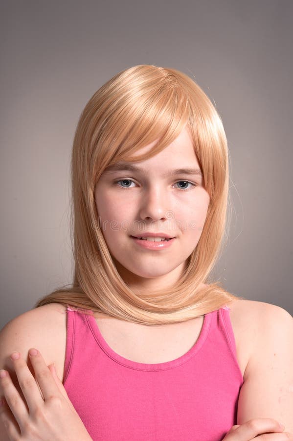 Close up portrait of cute girl posing in studio