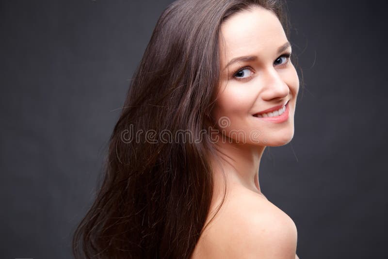 Close Up Portrait Of Elegant Brunette Woman With Nude Make Up Stock