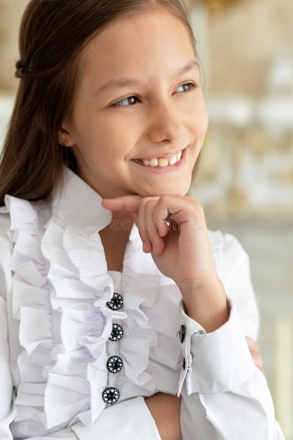 Close Up Portrait of Emotional Little Girl in White Blouse Posing at ...