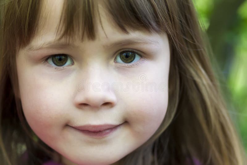 Close-up portrait of face of a little pretty girl