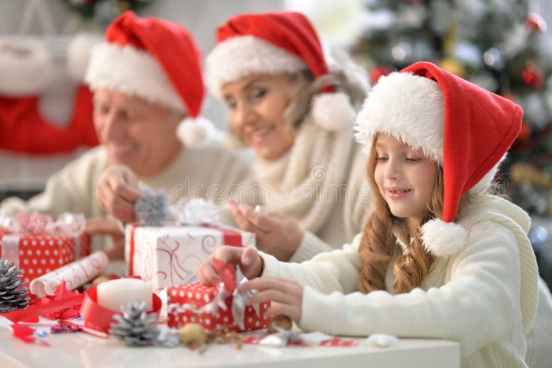Close up portrait of family celebrating Christmas stock photo Close up portrait of family celebrating Christmas stock photo