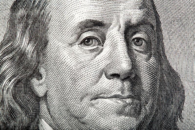 Close-up portrait of Franklin on American money.