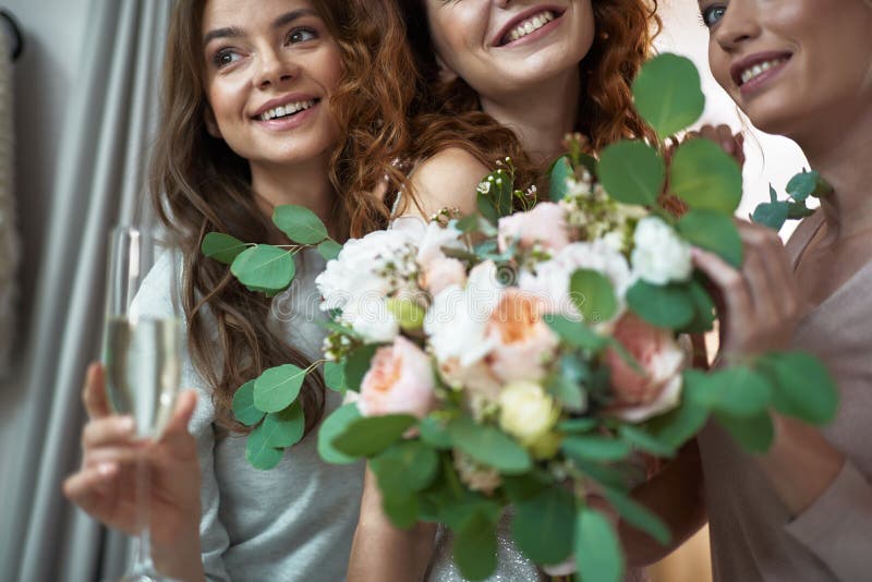 Happy Bride and Her Friend Posing in Wedding Salon Stock Photo - Image ...