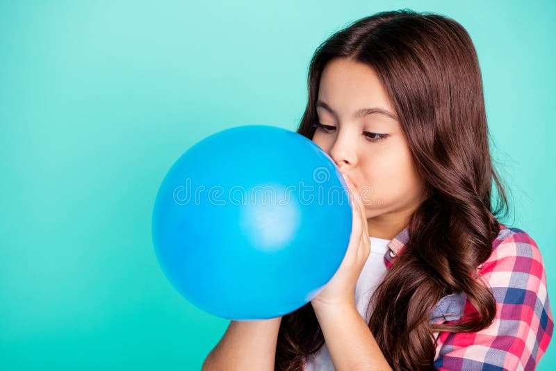 Close-up portrait of her she nice attractive cute charming wavy-haired girl in checked shirt blowing festive baloon fest royalty free stock photos Close-up portrait of her she nice attractive cute charming wavy-haired girl in checked shirt blowing festive baloon fest royalty free stock photos