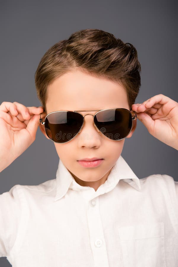 Close Up Portrait of Little Serious Cool Boy in Glasses Stock Photo ...