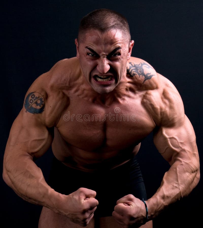 Close-up portrait of scary man looking stressed