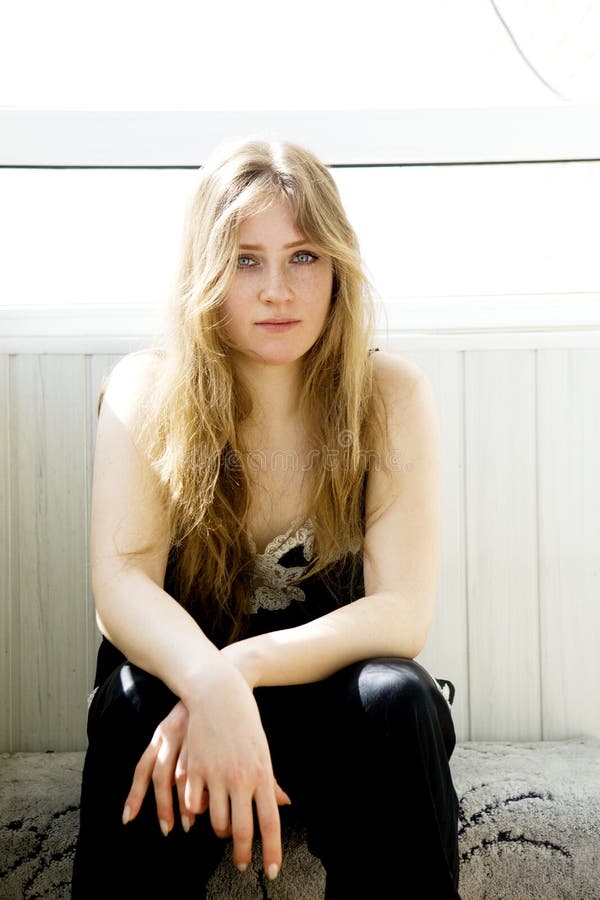 Close up portrait of serious teen girl