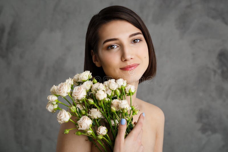 Close Up Portrait of Tender Young Girl with Flowers Ov image