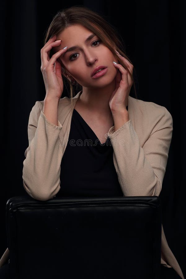 Close up.portrait of a thoughtful modern girl . isolated on black royalty free stock images Close up.portrait of a thoughtful modern girl . isolated on black royalty free stock images