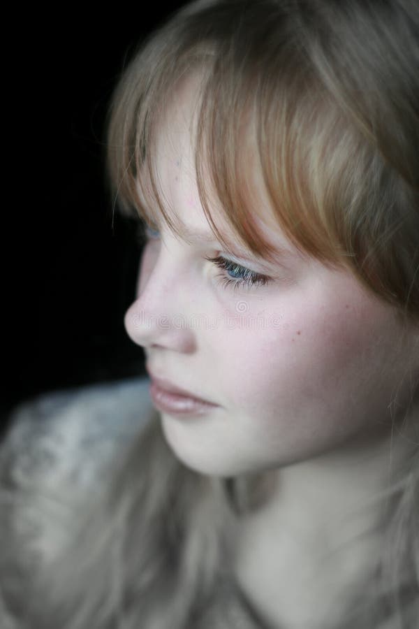 Close-up portrait thoughtfully young girl