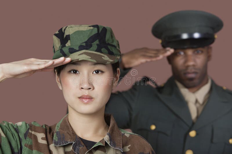 Close-up portrait of young female soldier with mal