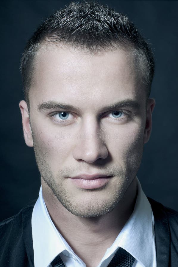 Close-up portrait of young handsome man