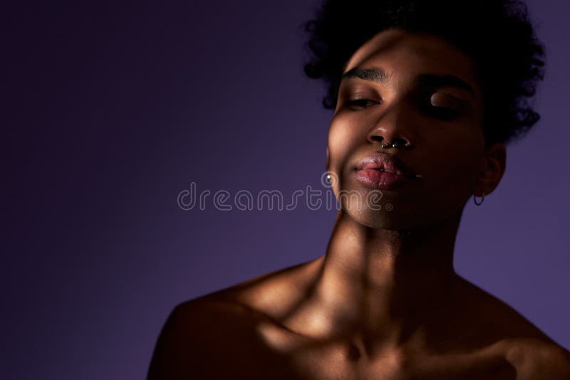 sad woman crying, looking aside on black background, closeup portrait,  profile view Stock Photo - Alamy