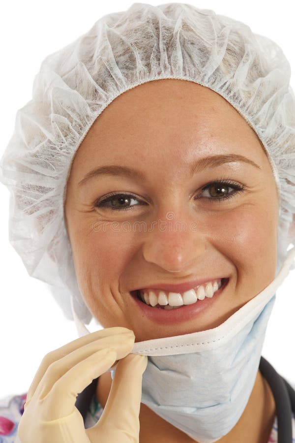 Close-up portrait of young woman nurse in scrubs