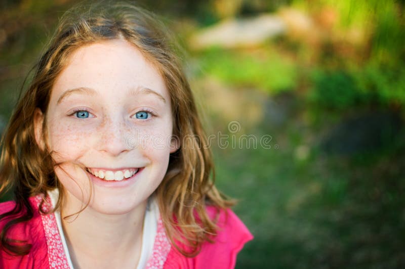 Close up of a pretty blue eyed girl stock photos