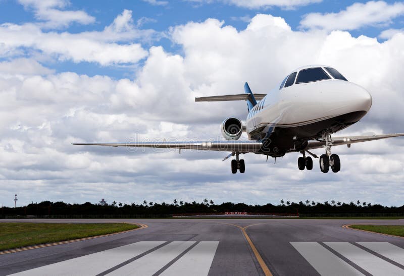 Close Up of a Private Jet Landing Stock Photo Image of fast, plane