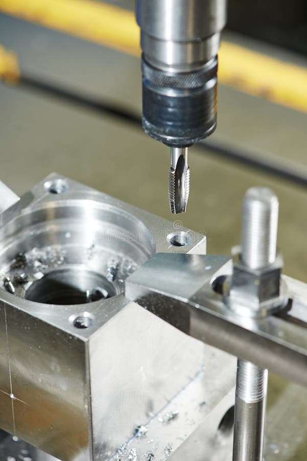 Close-up process of metal threading stock image