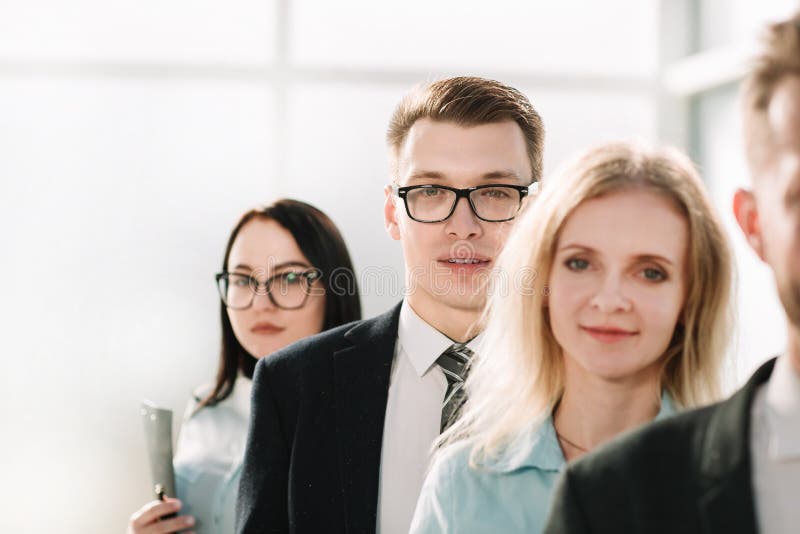 Close up. professional staff of the company standing together royalty free stock photography Close up. professional staff of the company standing together royalty free stock photography