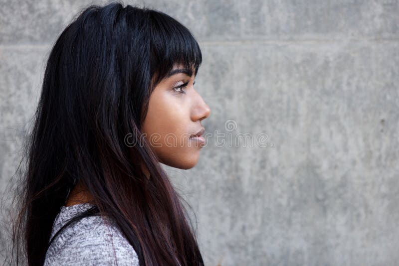 Profile portrait of beautiful young Indian woman