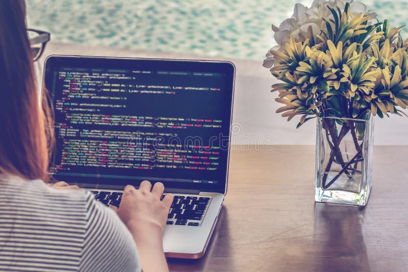 Woman freelance programmer working from home. php website code on screen. Programming Work Time. Programmer Typing New Lines of HTML Code. Laptop and Hand Closeup. Working Time. Web Design Business Concept. Source code script stock images, royalty-free photos and pictures