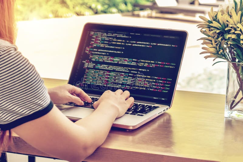 Woman freelance programmer working from home. php website code on screen. Programming Work Time. Programmer Typing New Lines of HTML Code. Laptop and Hand Closeup. Working Time. Web Design Business Concept. Source code script stock images, royalty-free photos and pictures