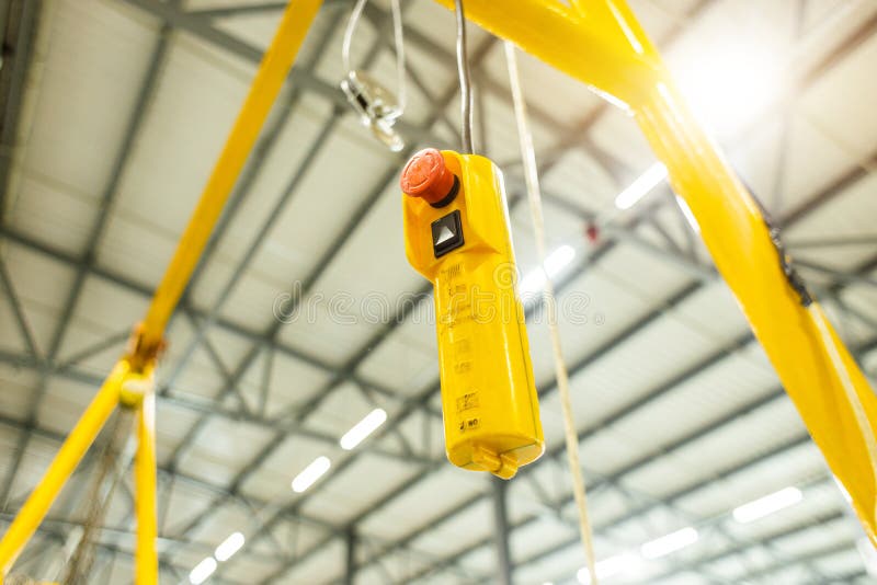 Close Up Red Button. Swivel Electric Crane Hook for Overhead Crane in