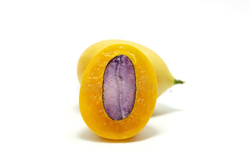 Closeup Of Ripe Marian Plum Or Plum Mango Cut In Half This Is Thai Fruit In Studio Shot On A