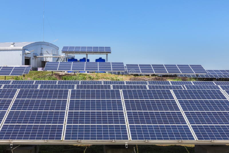 Close up rows array of polycrystalline silicon solar cells or photovoltaics in solar power plant turn up skyward stock photos Close up rows array of polycrystalline silicon solar cells or photovoltaics in solar power plant turn up skyward stock photos