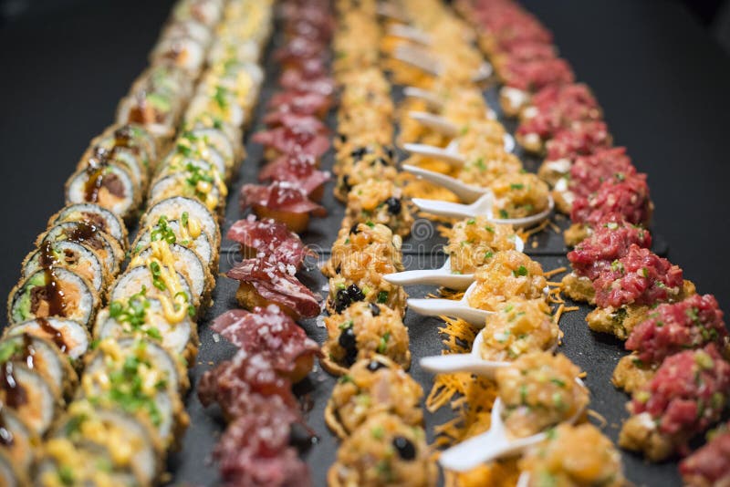 Rows of sushi on platter