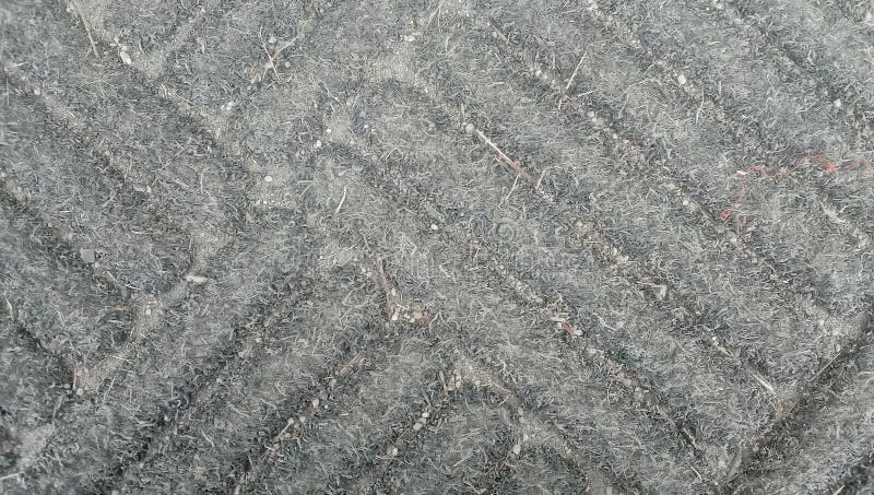 Close-up of a rustic grey natural fiber texture with organic patterns. High-quality abstract background photography royalty free stock photography