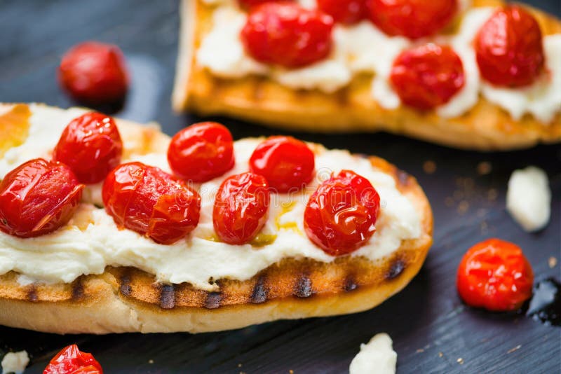 Rustic Italian Bruschetta with Caramelized Cherry Tomatoes and Ricotta