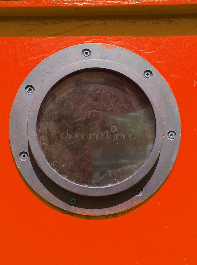 close up of rusty metal vintage porthole on a red wooden boat stock photos close up of rusty metal vintage porthole on a red wooden boat stock photos
