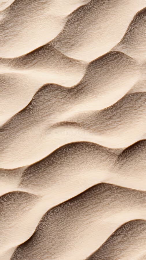 A close up of a sand dune with wavy lines on it stock photo