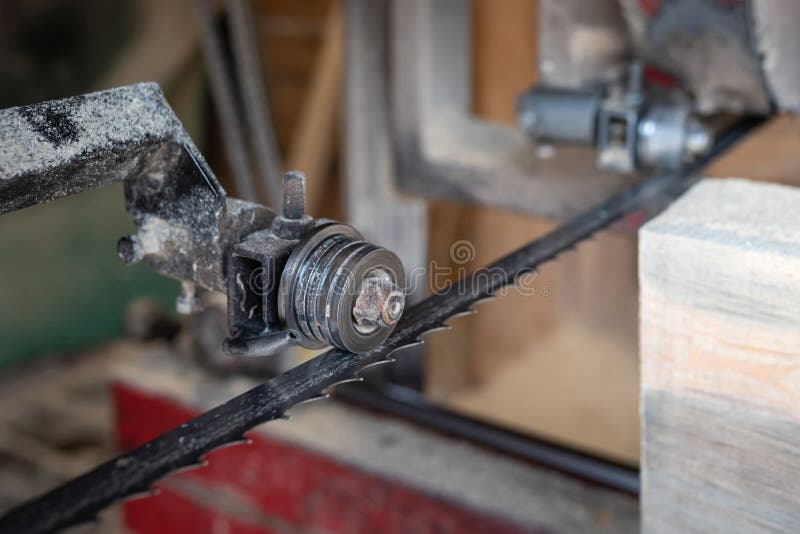 Closeup of a Saw for Processing and Cutting Wood at a Sawmill. Stock